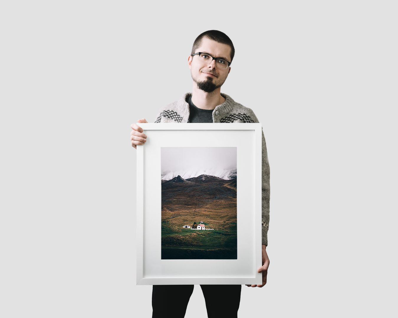 Nordic travel photography print featuring a lonely farmhouse in the mountains in Iceland