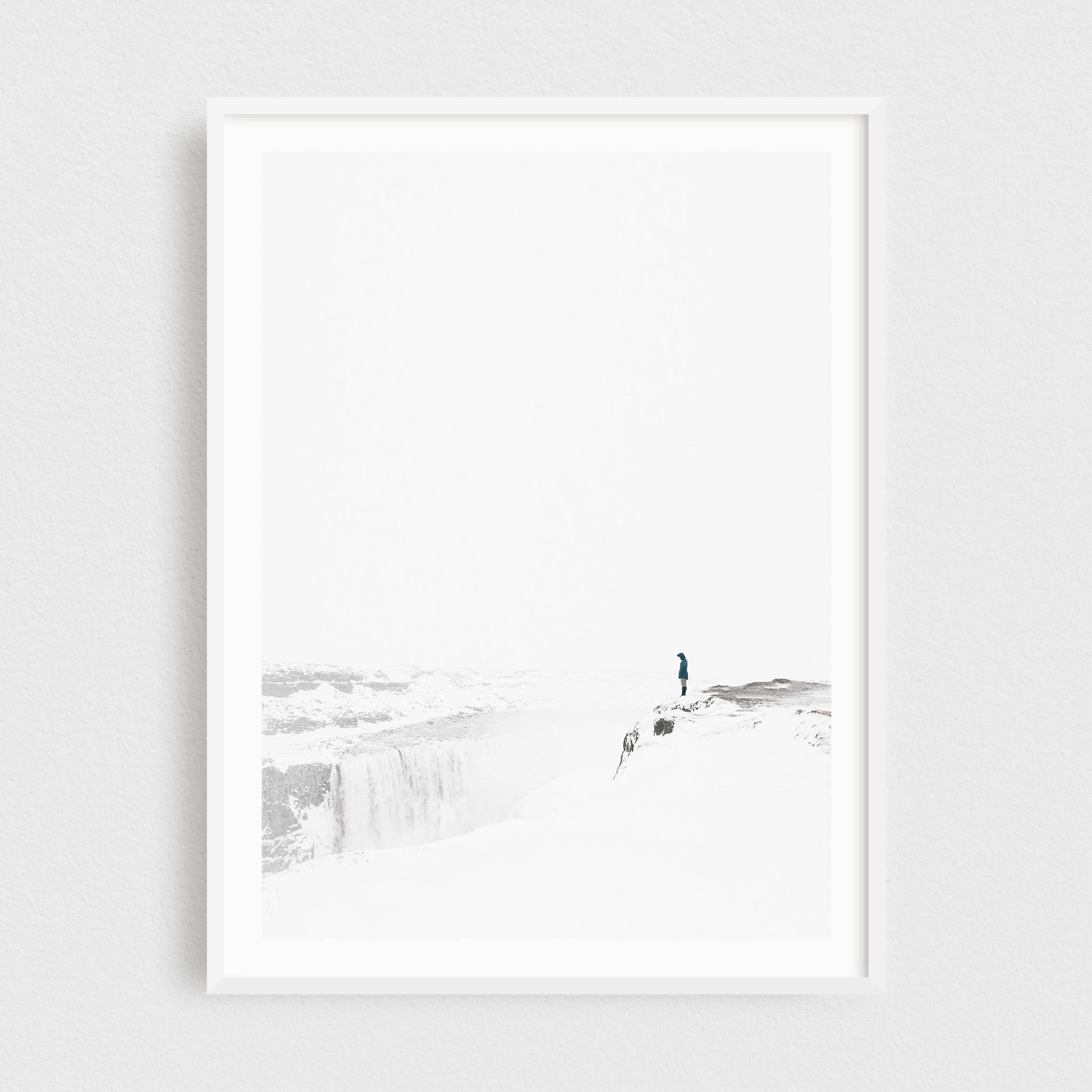 Iceland fine art photography print featuring Dettifoss waterfall in winter, in a white frame