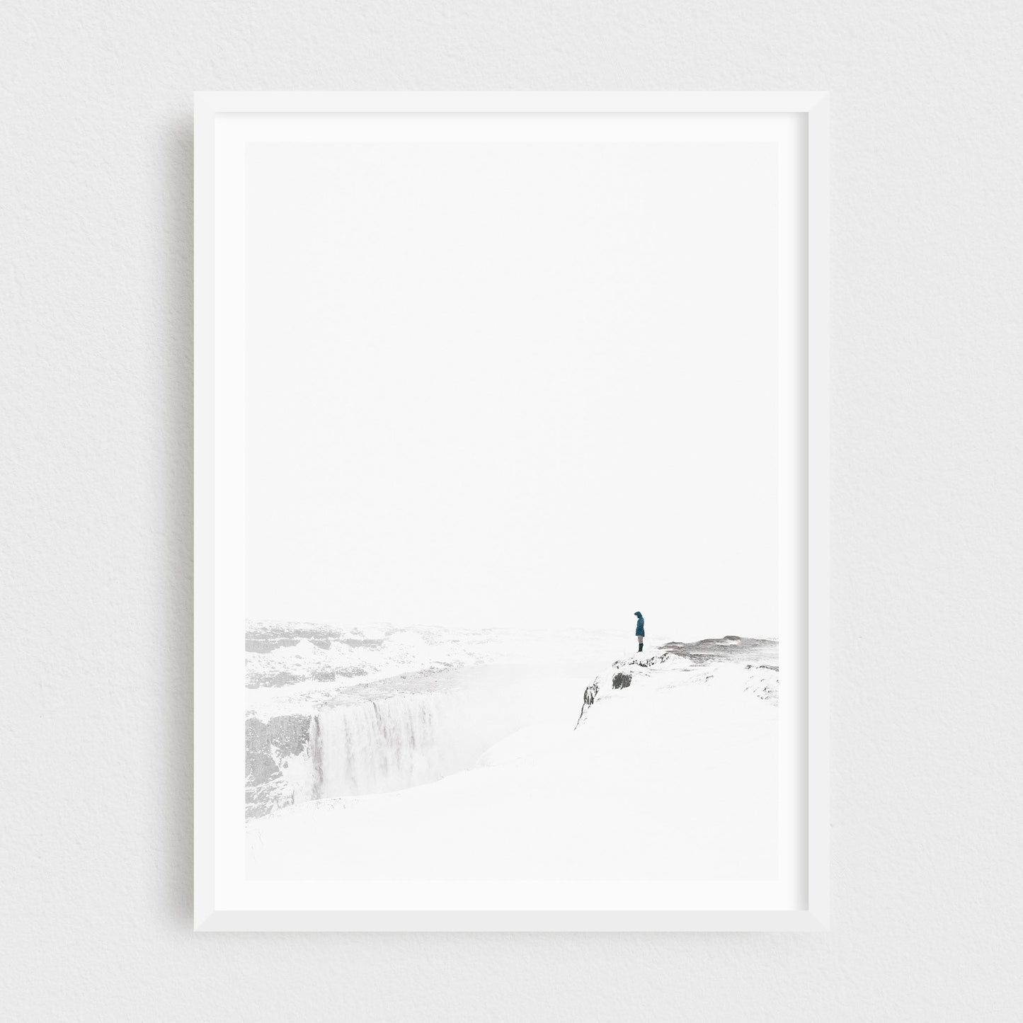 Iceland fine art photography print featuring Dettifoss waterfall in winter, in a white frame