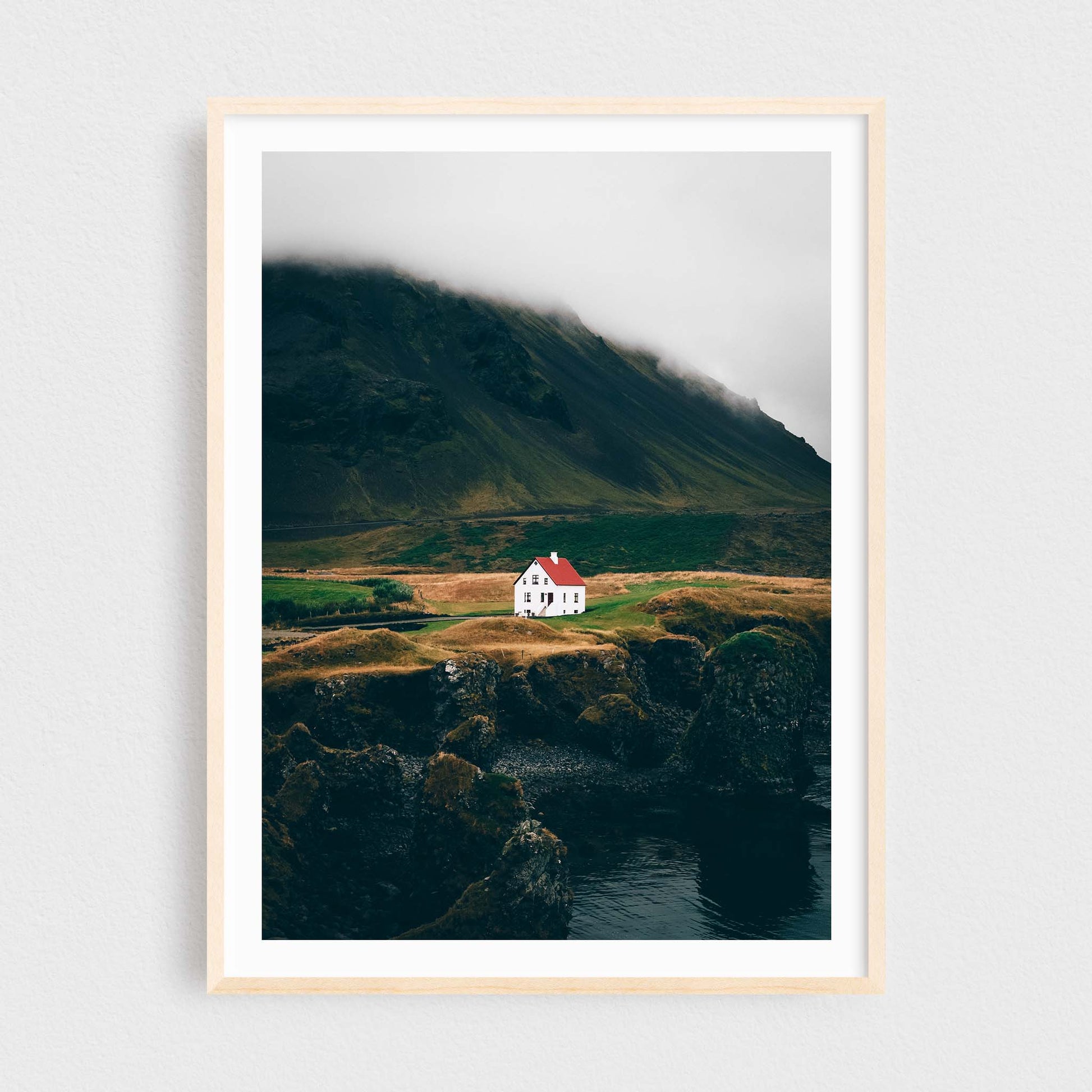 Iceland fine art photography print featuring Arnarstapi lonely house, in a maple frame