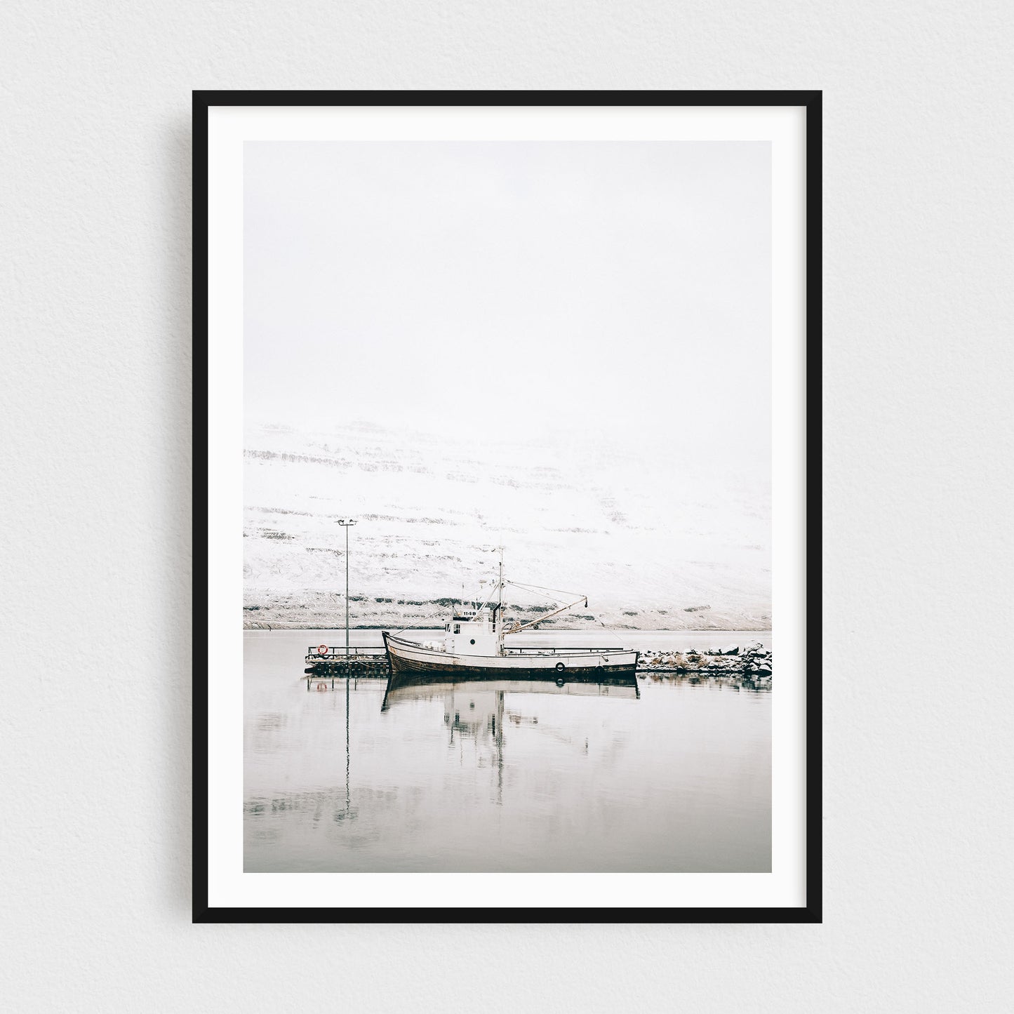 Iceland fine art photography print featuring Seydisfjordur fishing vessel in the fjord in winter