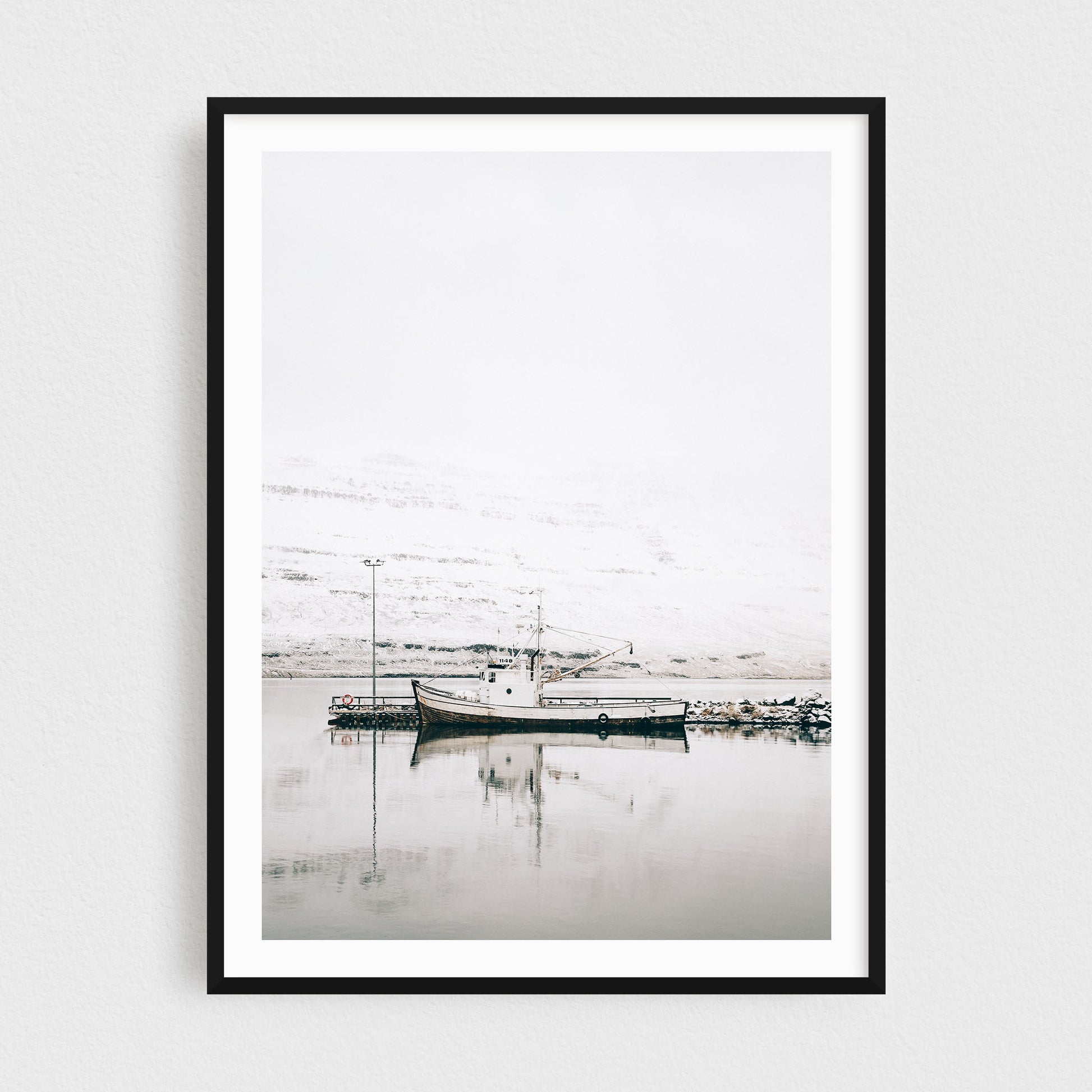 Iceland fine art photography print featuring Seydisfjordur fishing vessel in the fjord in winter