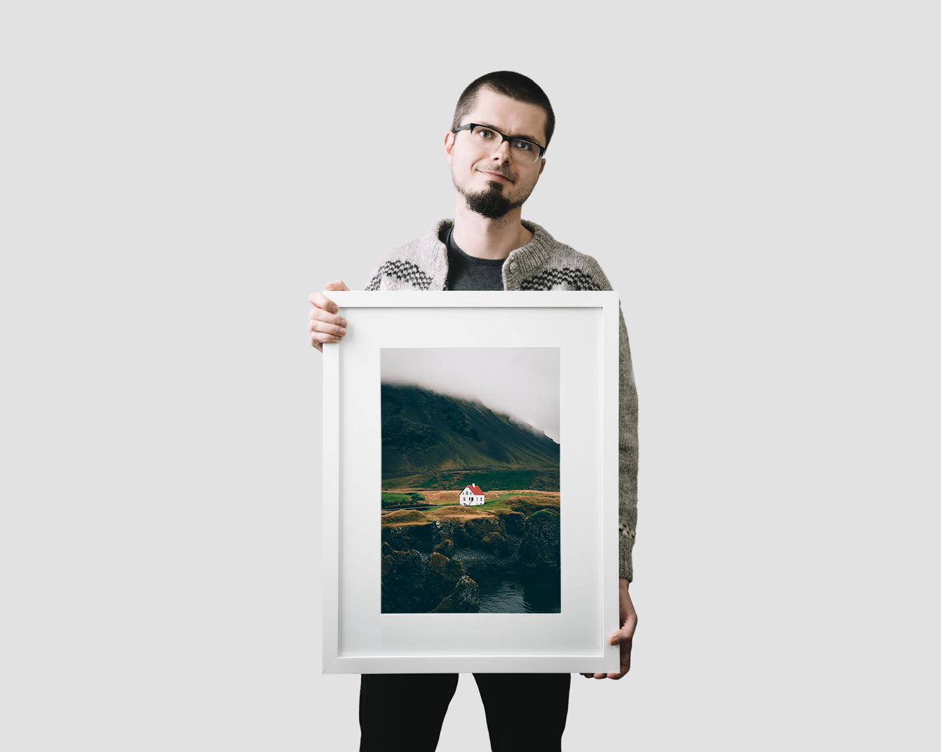 Nordic travel photography print featuring a lonely house by the ocean in Arnarstapi, Iceland