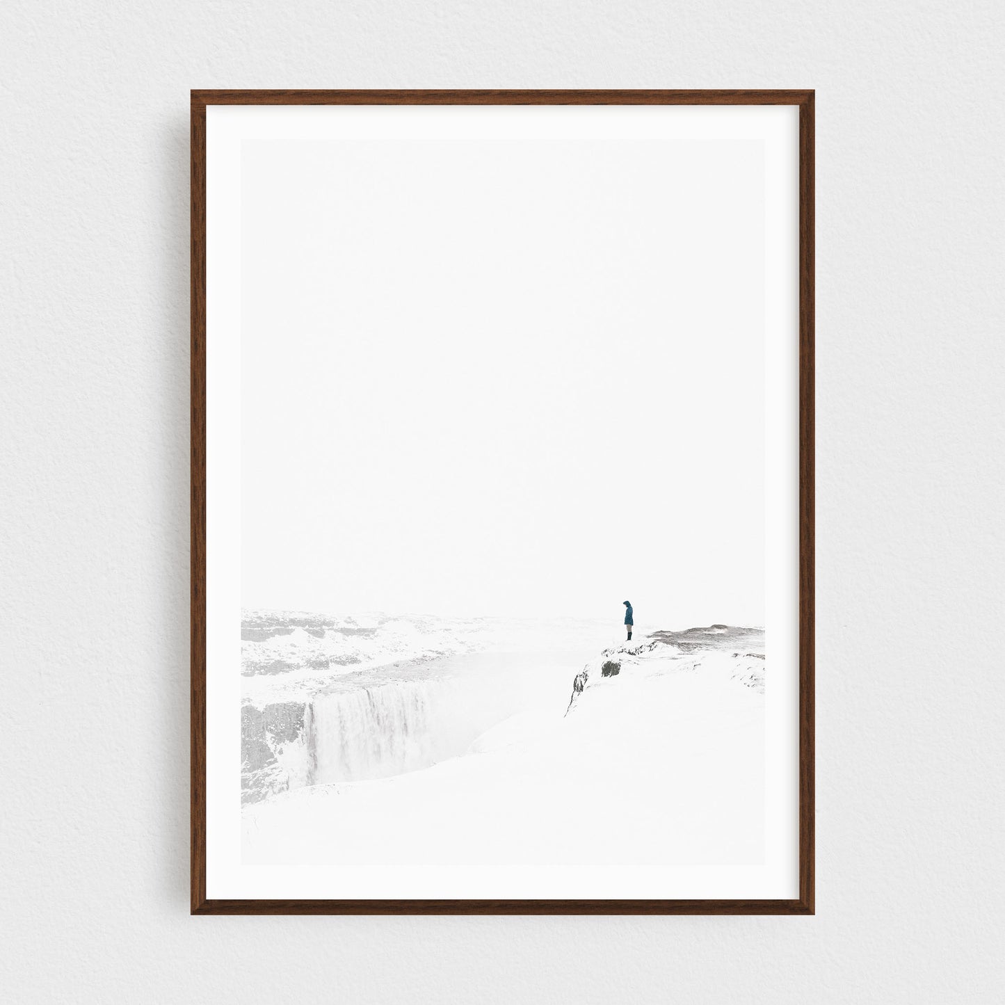 Iceland fine art photography print featuring Dettifoss waterfall in winter, in a walnut frame
