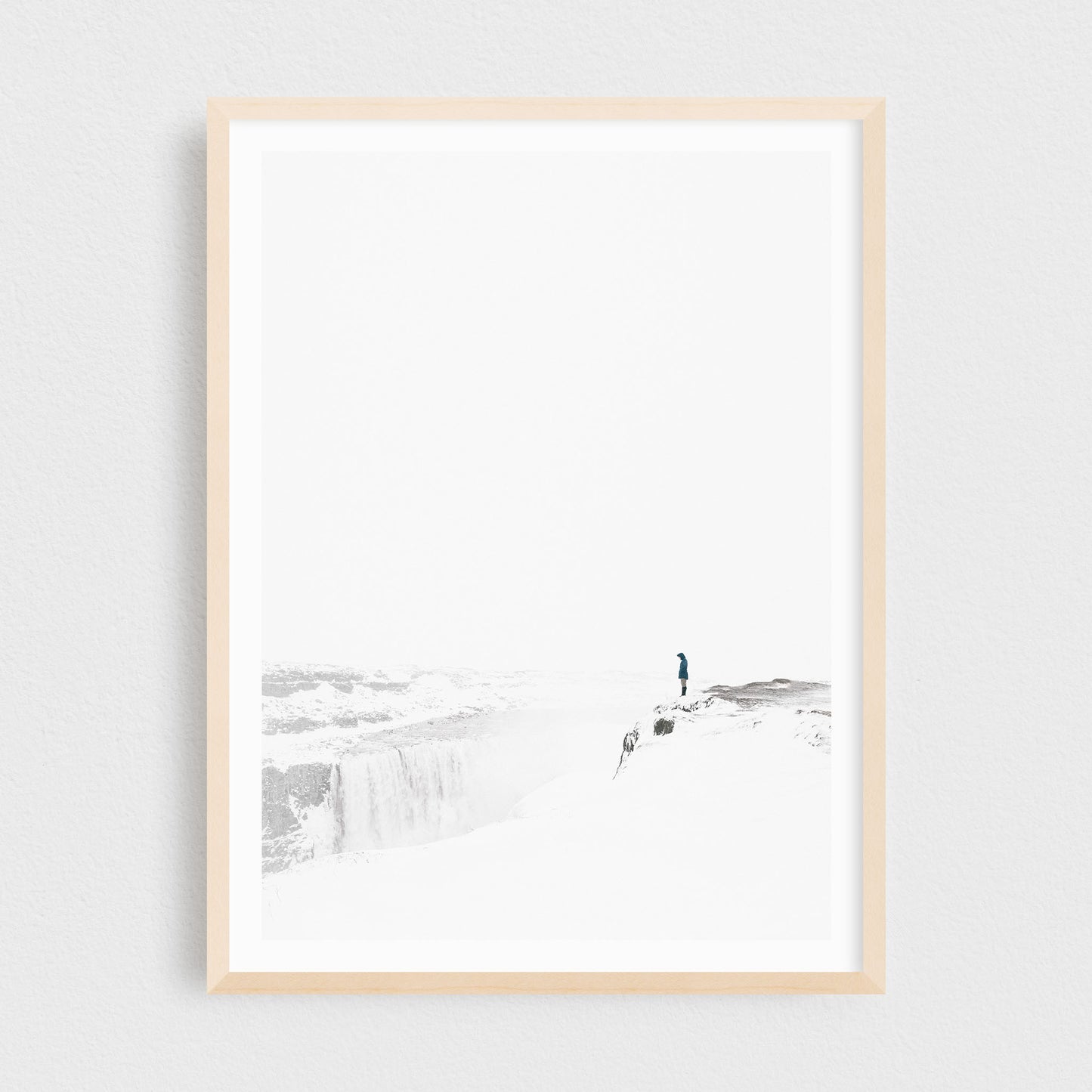 Iceland fine art photography print featuring Dettifoss waterfall in winter, in a maple frame