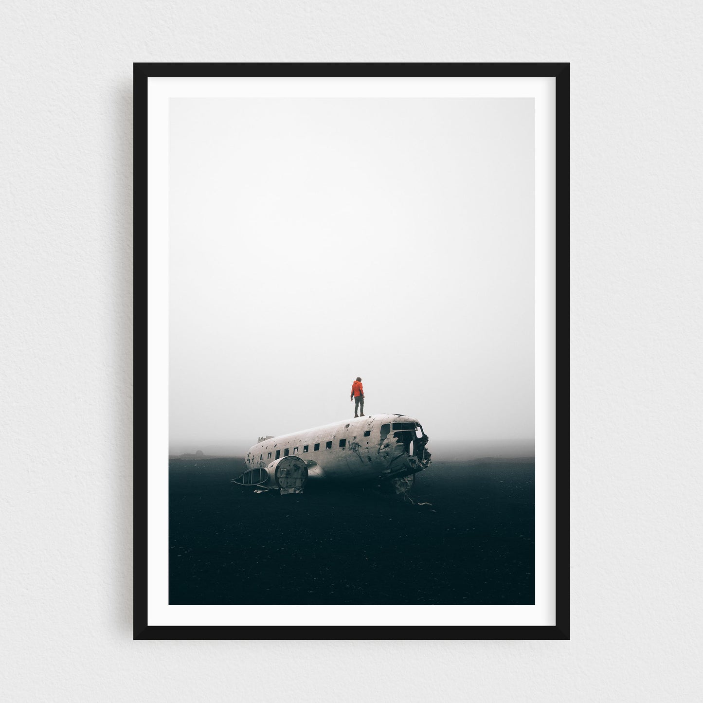 Iceland fine art photography print featuring DC3 plane crash at Solheimasandur, in a black frame