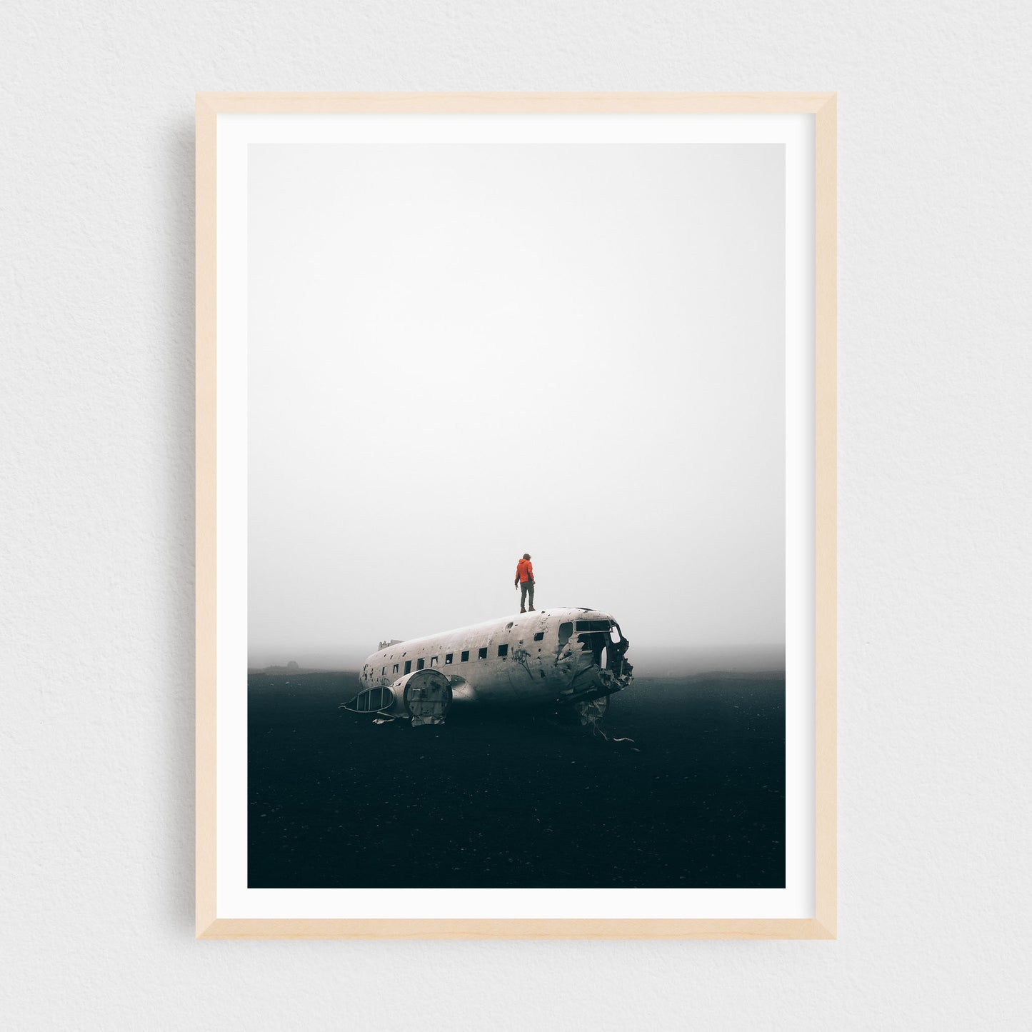 Iceland fine art photography print featuring DC3 plane crash at Solheimasandur, in a maple frame