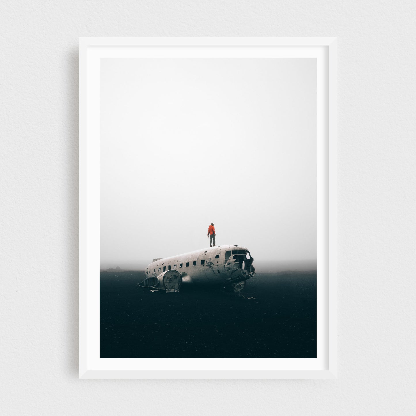 Iceland fine art photography print featuring DC3 plane crash at Solheimasandur, in a white frame