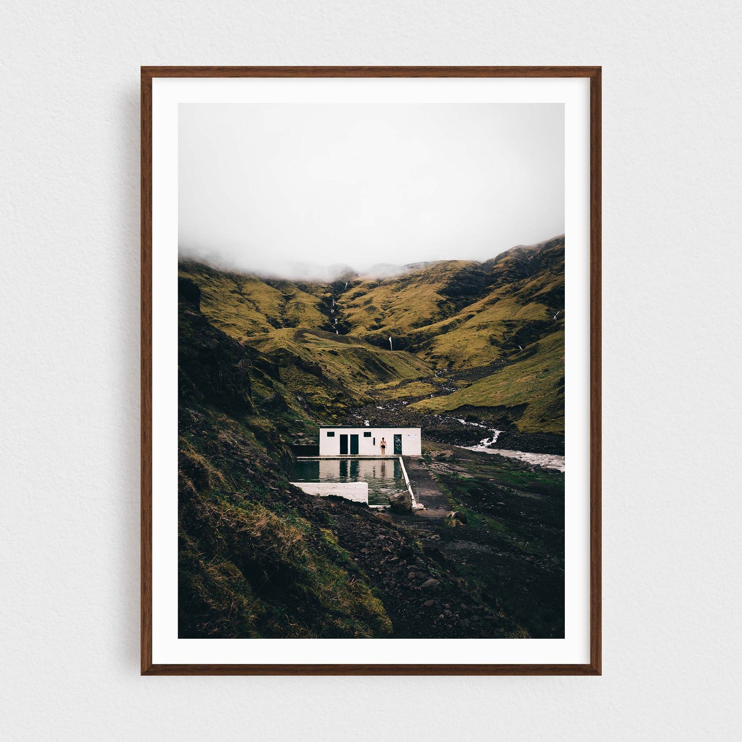 Iceland fine art photography print featuring Seljavallalaug pool, in a walnut frame