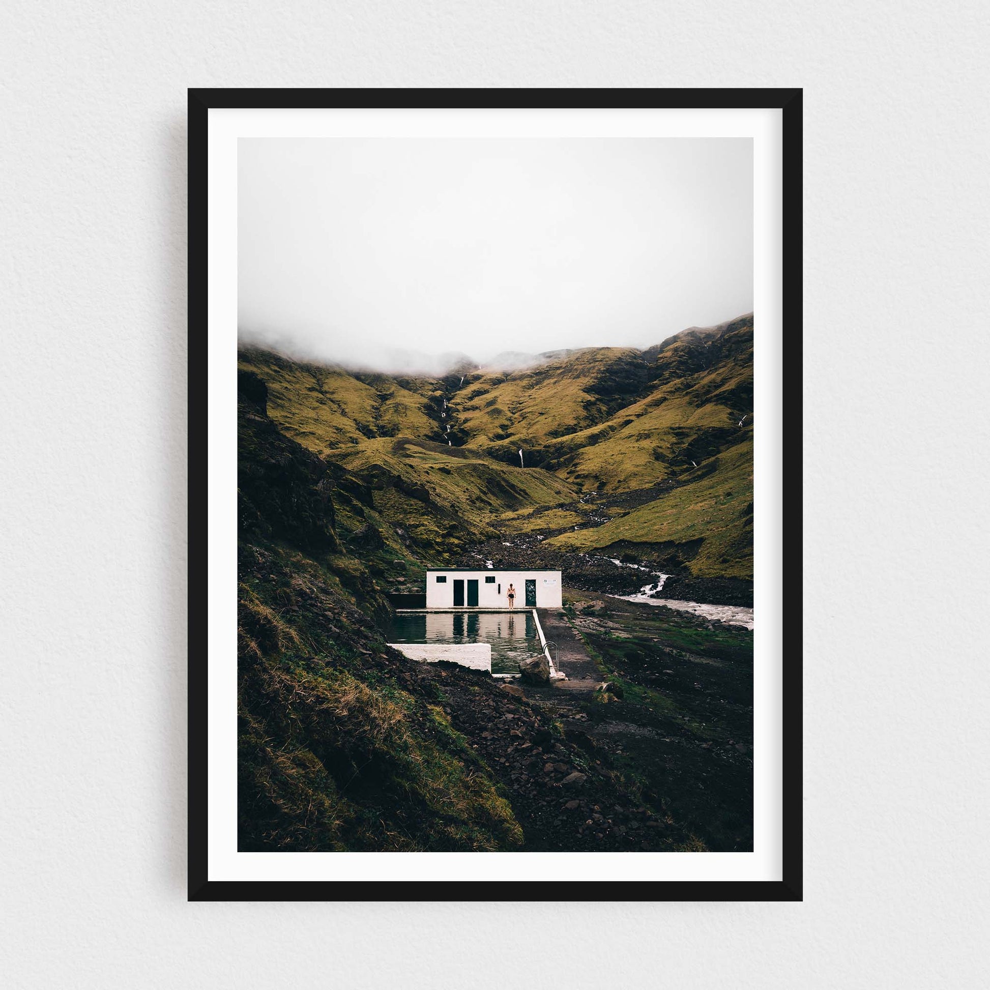 Iceland fine art photography print featuring Seljavallalaug pool, in a black frame