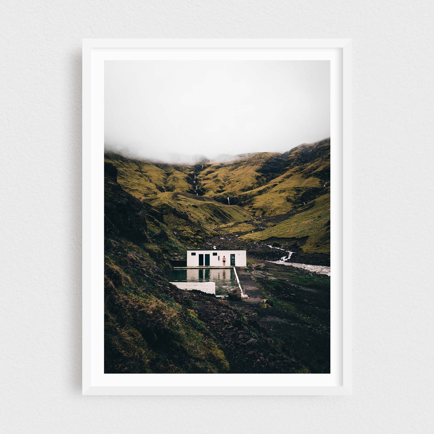 Iceland fine art photography print featuring Seljavallalaug pool, in a white frame
