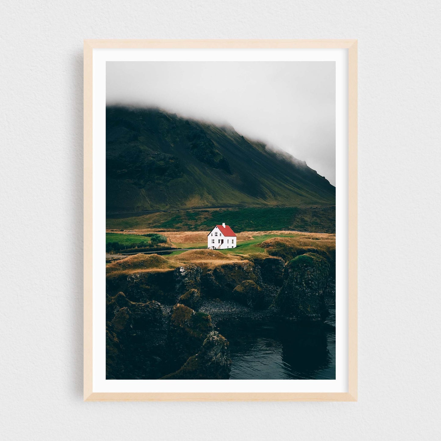 Iceland fine art photography print featuring Arnarstapi lonely house, in a maple frame