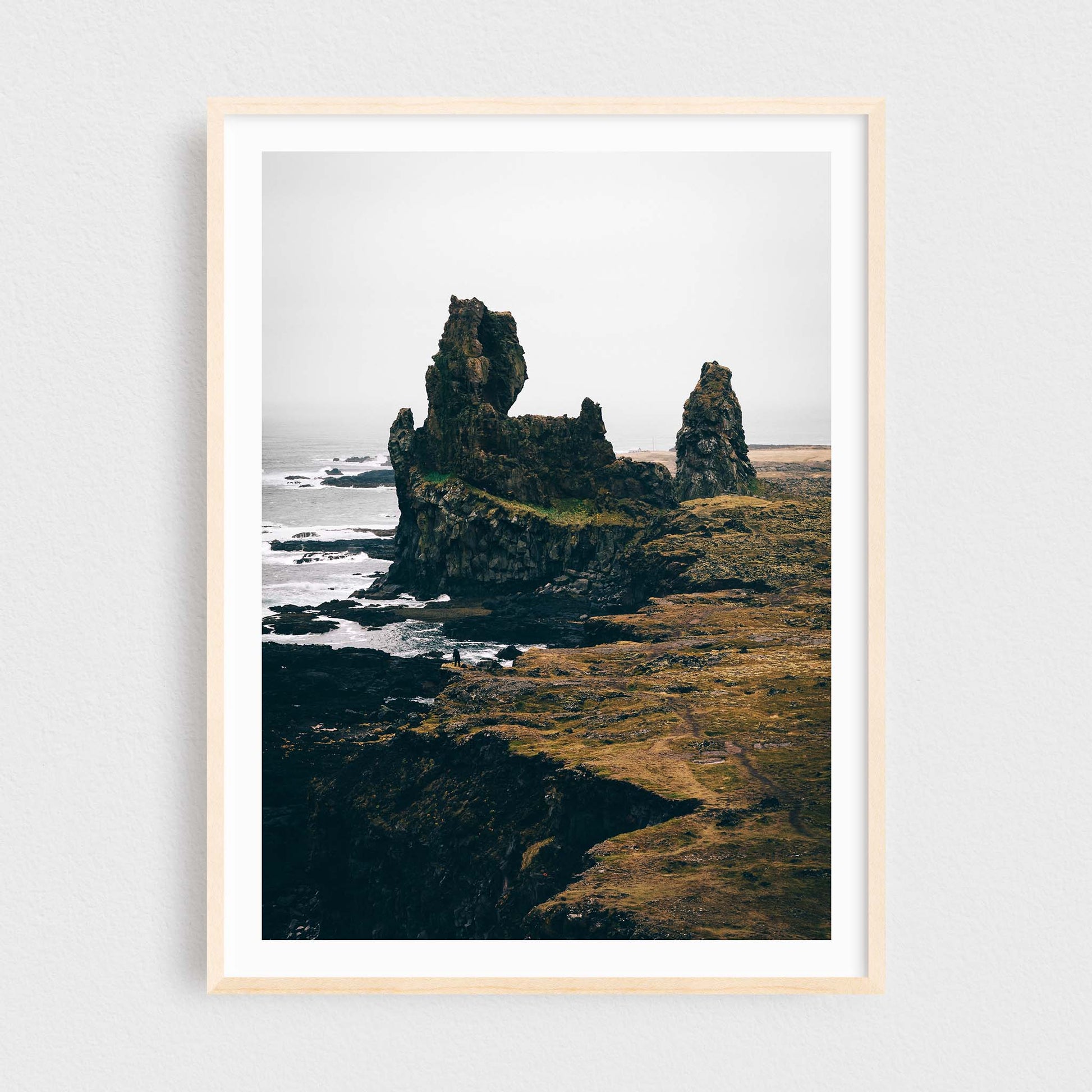 Iceland fine art photography print featuring Londrangar rock formations, in a maple frame