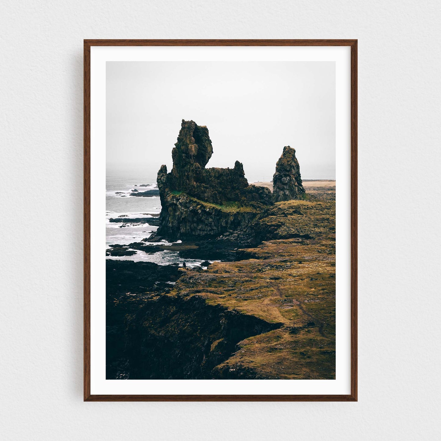 Iceland fine art photography print featuring Londrangar rock formations, in a walnut frame