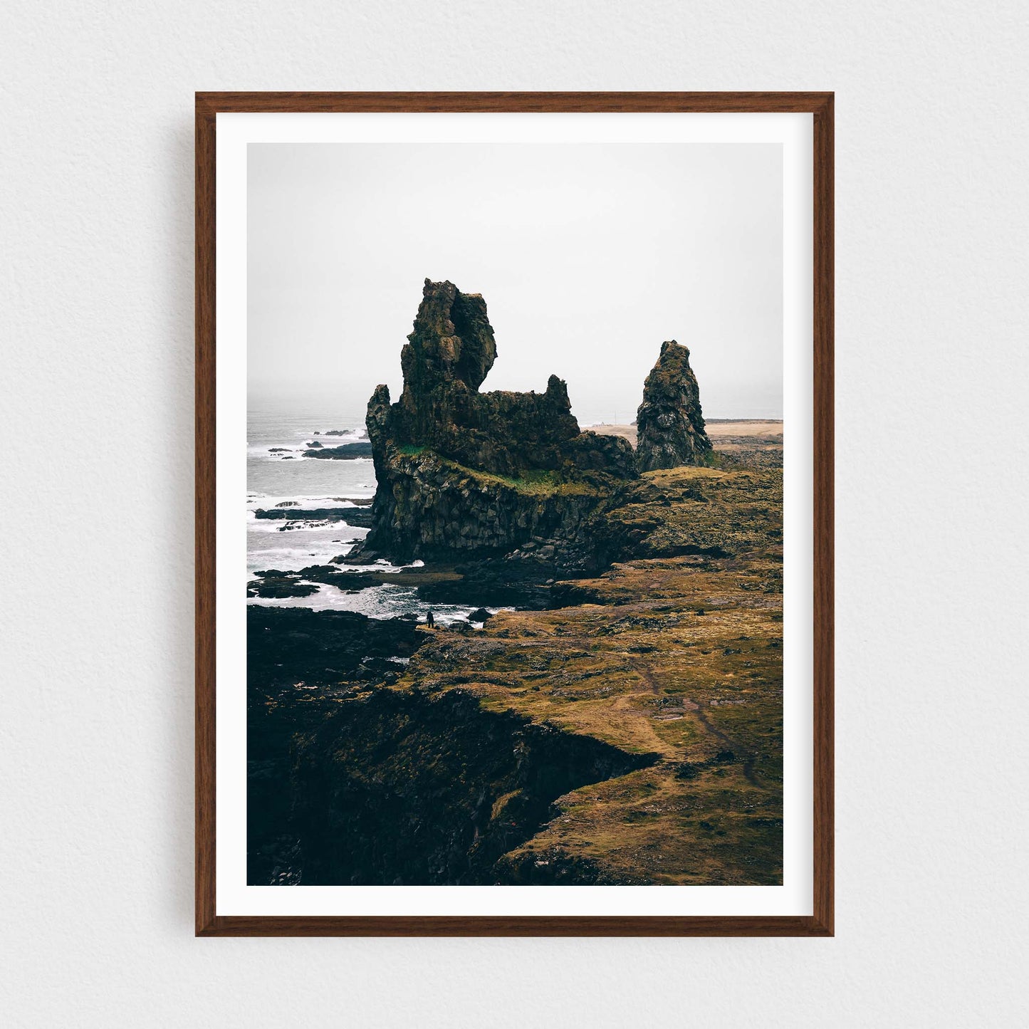 Iceland fine art photography print featuring Londrangar rock formations, in a walnut frame