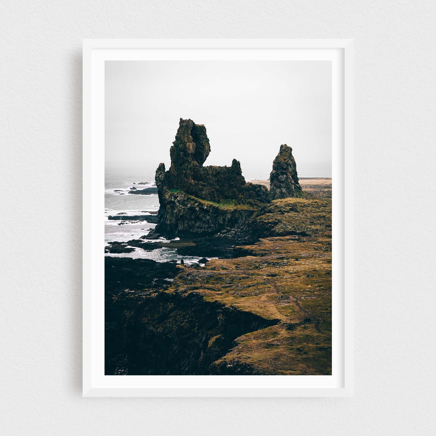 Iceland fine art photography print featuring Londrangar rock formations, in a white frame