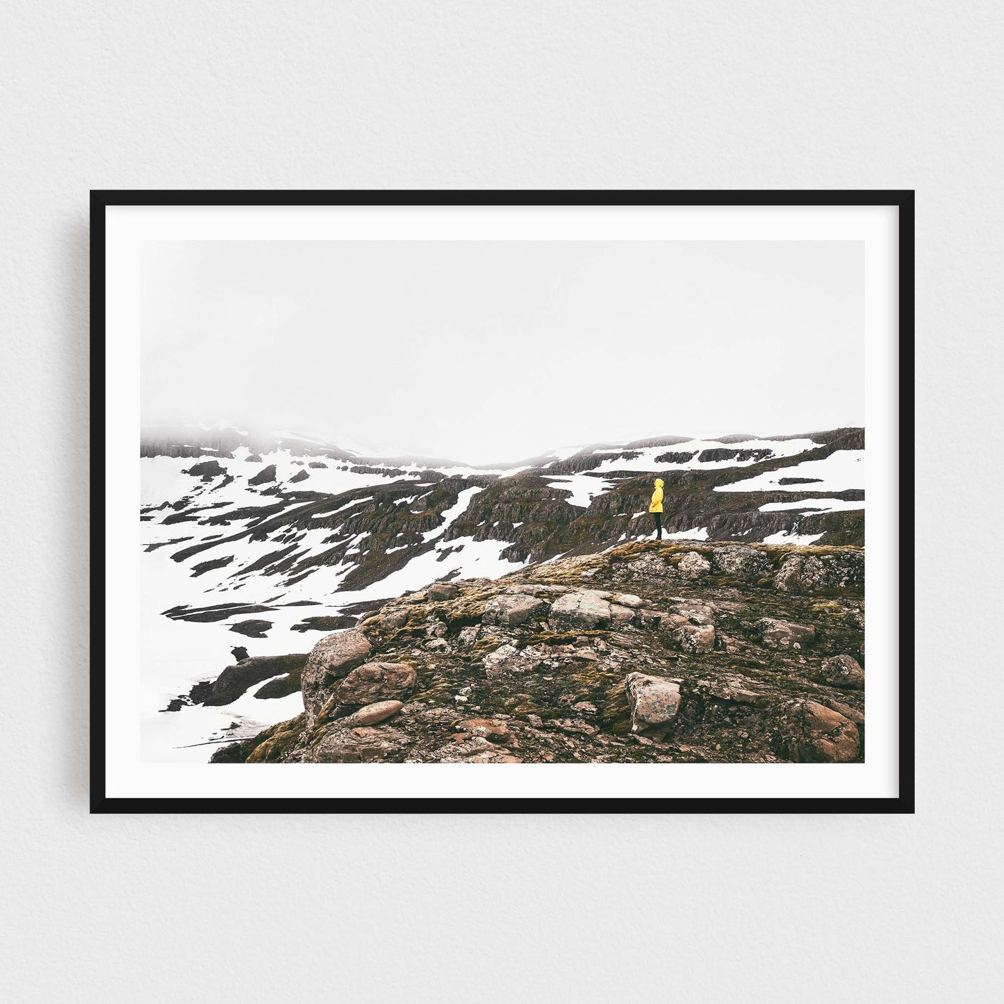 Iceland fine art photography print featuring a lonely hiker in the mountains in winter